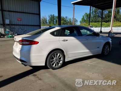 Trzecie zdjęcie samochodu z tyłu: 2018 FORD FUSION SE PHEV VIN:3FA6P0PUXJR260900 - miniatura
