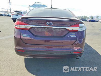 Zdjęcie 6 z 12 samochodu: 2017 FORD FUSION TITANIUM PHEV VIN:3FA6P0SU8HR276403 - miniatura