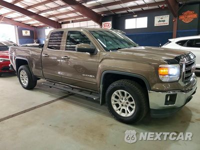 Czwarte zdjęcie samochodu z boku: 2014 GMC SIERRA K1500 SLE VIN:1GTV2UECXEZ386083 - miniatura