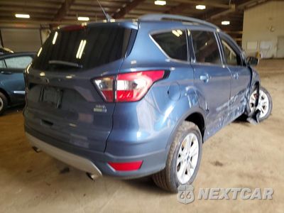 Trzecie zdjęcie samochodu z tyłu: 2018 FORD ESCAPE SEL VIN:1FMCU9HD0JUC47487 - miniatura