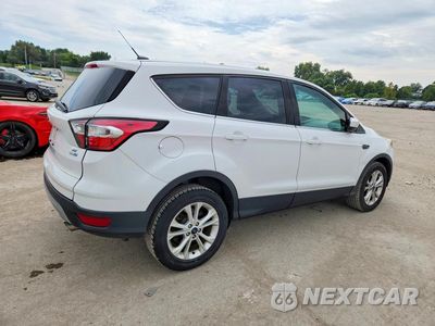 Trzecie zdjęcie samochodu z tyłu: 2017 FORD ESCAPE SE VIN:1FMCU9GDXHUE49250 - miniatura
