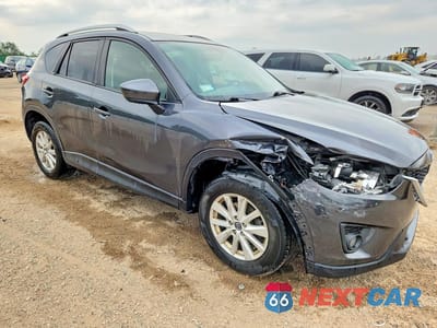 Czwarte zdjęcie samochodu z boku: 2014 MAZDA CX-5 TOURING VIN:JM3KE4CY2E0384915 - miniatura