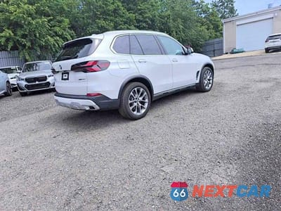 Czwarte zdjęcie samochodu z boku: 2026 BMW X5 XDRIVE40I VIN:5UX23EU09T9191603 - miniatura