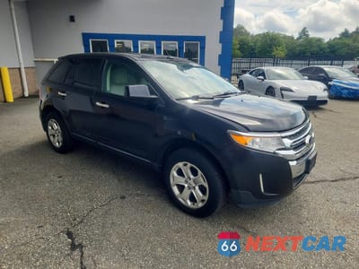 Czwarte zdjęcie samochodu z boku: 2011 FORD EDGE VIN:2FMDK4JC4BBA62882 - miniatura