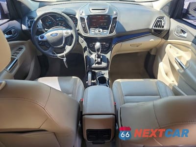 Zdjęcie 8 z 12 samochodu: 2014 FORD ESCAPE TITANIUM VIN:1FMCU0J94EUE20287 - miniatura