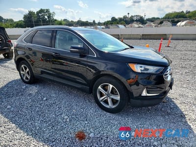 Czwarte zdjęcie samochodu z boku: 2019 FORD EDGE SEL VIN:2FMPK4J90KBC58190 - miniatura