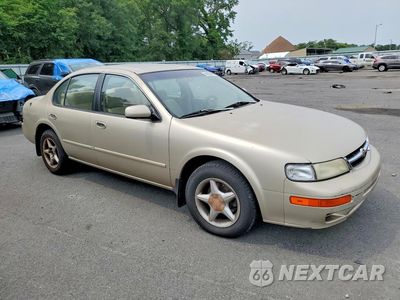 Czwarte zdjęcie samochodu z boku: 1999 NISSAN MAXIMA GXE VIN:JN1CA21D9XM407604 - miniatura