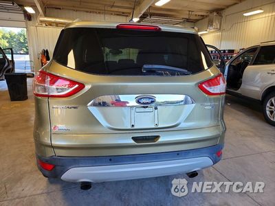 Zdjęcie 6 z 13 samochodu: 2014 FORD ESCAPE TITANIUM VIN:1FMCU9JX8EUB49642 - miniatura