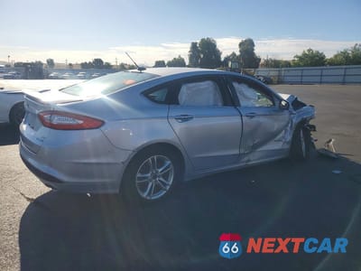 Trzecie zdjęcie samochodu z tyłu: 2016 FORD FUSION SE HYBRID VIN:3FA6P0LU0GR316289 - miniatura