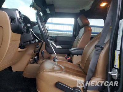 Zdjęcie 7 z 13 samochodu: 2013 JEEP WRANGLER UNLIMITED SAHARA VIN:1C4BJWEG4DL688457 - miniatura