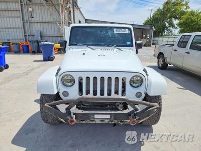 Piąte zdjęcie samochodu w środku: 2015 JEEP WRANGLER UNLIMITED SAHARA VIN:1C4BJWEG6FL621815 - miniatura