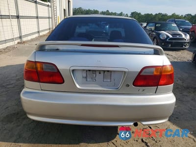 Zdjęcie 6 z 12 samochodu: 1999 HONDA CIVIC LX VIN:1HGEJ6672XL014454 - miniatura