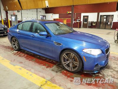 Czwarte zdjęcie samochodu z boku: 2012 BMW M5 VIN:WBSFV9C50CC772288 - miniatura
