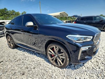 Czwarte zdjęcie samochodu z boku: 2021 BMW X6 M50I VIN:5UXCY8C03M9E36666 - miniatura
