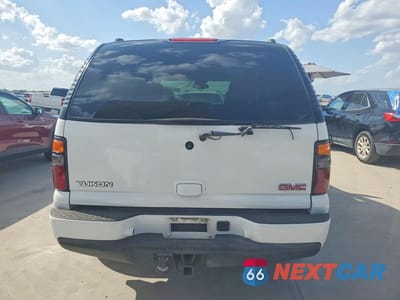 Zdjęcie 6 z 12 samochodu: 2004 GMC YUKON DENALI VIN:1GKEK63U54J273067 - miniatura