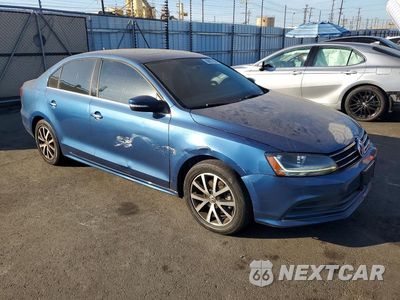 Czwarte zdjęcie samochodu z boku: 2017 VOLKSWAGEN JETTA SE VIN:3VWDB7AJ3HM257462 - miniatura