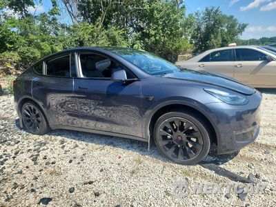 Czwarte zdjęcie samochodu z boku: 2020 TESLA MODEL Y VIN:5YJYGDEE9LF045843 - miniatura