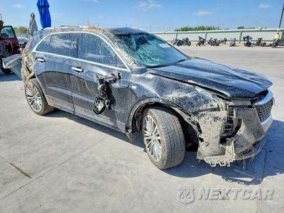 Czwarte zdjęcie samochodu z boku: 2024 CADILLAC XT4 PREMIUM LUXURY VIN:1GYFZCR46RF102463 - miniatura