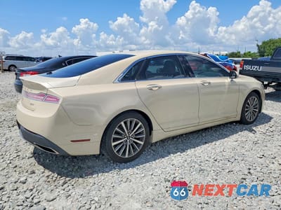 Trzecie zdjęcie samochodu z tyłu: 2018 LINCOLN MKZ PREMIERE VIN:3LN6L5A98JR604291 - miniatura