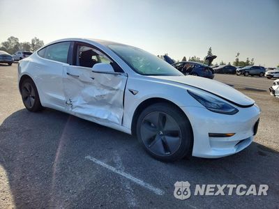 Czwarte zdjęcie samochodu z boku: 2020 TESLA MODEL 3 VIN:5YJ3E1EA1LF658860 - miniatura