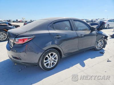 Trzecie zdjęcie samochodu z tyłu: 2016 SCION IA BASE VIN:3MYDLBZV6GY123807 - miniatura