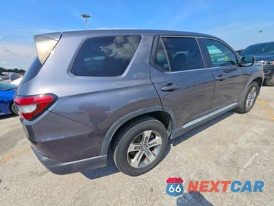 Czwarte zdjęcie samochodu z boku: 2023 HONDA PILOT EXL VIN:5FNYG1H57PB023517 - miniatura