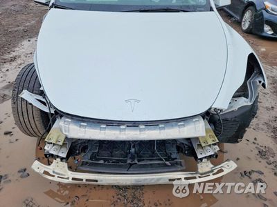 Zdjęcie 12 z 14 samochodu: 2023 TESLA MODEL Y VIN:7SAYGDEE5PF797211 - miniatura