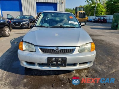 Piąte zdjęcie samochodu w środku: 2000 MAZDA PROTEGE ES VIN:JM1BJ223XY0280045 - miniatura