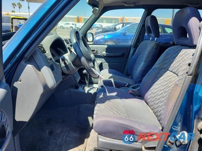 Zdjęcie 7 z 13 samochodu: 2000 TOYOTA RAV4 BASE VIN:JT3GP10V2Y7069971 - miniatura