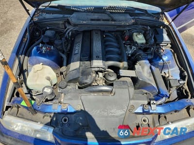 Zdjęcie 11 z 12 samochodu: 1998 BMW 323 IC VIN:WBABJ7329WEA15202 - miniatura