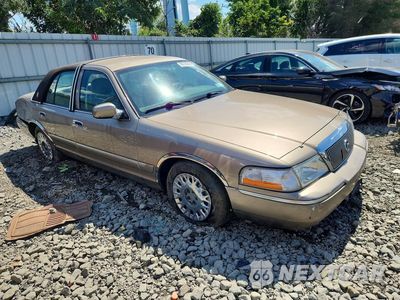 Czwarte zdjęcie samochodu z boku: 2004 MERCURY GRAND MARQUIS GS VIN:2MEFM74W94X672232 - miniatura