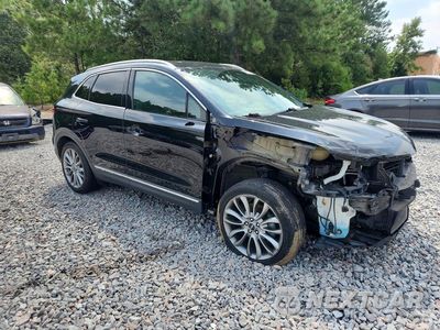 Czwarte zdjęcie samochodu z boku: 2017 LINCOLN MKC RESERVE VIN:5LMCJ3C90HUL70691 - miniatura