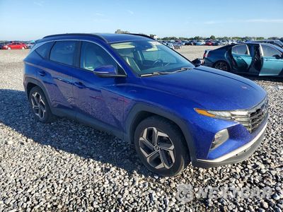 Czwarte zdjęcie samochodu z boku: 2022 HYUNDAI TUCSON SEL VIN:5NMJC3AE1NH009952 - miniatura
