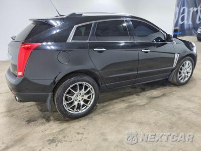Trzecie zdjęcie samochodu z tyłu: 2014 CADILLAC SRX PERFORMANCE COLLECTION VIN:3GYFNFE31ES657367 - miniatura