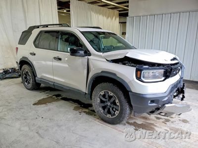 Czwarte zdjęcie samochodu z boku: 2026 HONDA PASSPORT TRAILSPORT ELITE VIN:5FNYF9H88TB022804 - miniatura