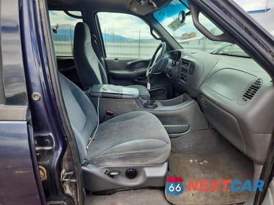 Zdjęcie 7 z 12 samochodu: 2000 FORD EXPEDITION XLT VIN:1FMPU16L2YLA60765 - miniatura
