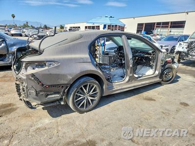 Trzecie zdjęcie samochodu z tyłu: 2024 TOYOTA CAMRY HYBRID SE VIN:4T1G31AK7RU624116 - miniatura