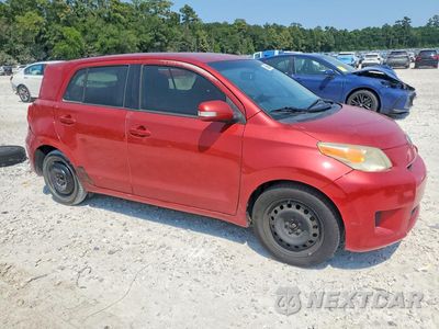 Czwarte zdjęcie samochodu z boku: 2011 SCION XD BASE VIN:JTKKU4B40B1015057 - miniatura
