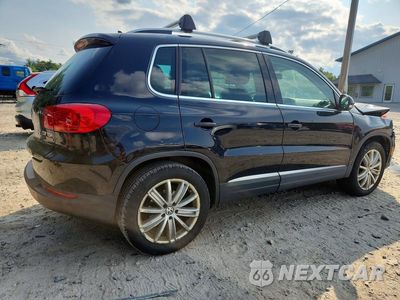 Trzecie zdjęcie samochodu z tyłu: 2014 VOLKSWAGEN TIGUAN S VIN:WVGBV3AX3EW566595 - miniatura