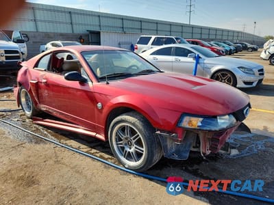 Czwarte zdjęcie samochodu z boku: 2004 FORD MUSTANG GT VIN:1FAFP42XX4F104382 - miniatura