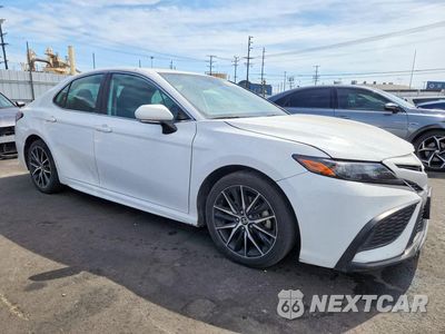 Czwarte zdjęcie samochodu z boku: 2023 TOYOTA CAMRY HYBRID SE VIN:4T1G31AK2PU601825 - miniatura