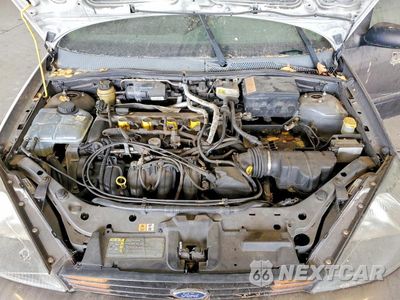Zdjęcie 11 z 12 samochodu: 2004 FORD FOCUS ZTS VIN:1FAFP38Z24W133006 - miniatura