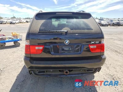 Zdjęcie 6 z 12 samochodu: 2004 BMW X5 4.8IS VIN:5UXFA93524LE81412 - miniatura