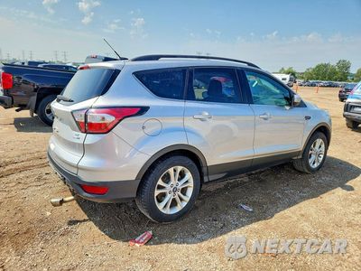 Trzecie zdjęcie samochodu z tyłu: 2018 FORD ESCAPE SE VIN:1FMCU9GD9JUA02480 - miniatura