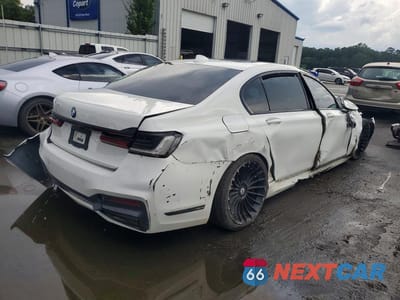 Trzecie zdjęcie samochodu z tyłu: 2022 BMW 750 XI VIN:WBA7U2C04NCH44975 - miniatura