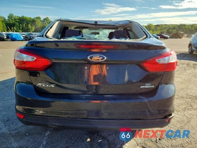Zdjęcie 6 z 12 samochodu: 2014 FORD FOCUS SE VIN:1FADP3F24EL460040 - miniatura