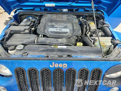 Zdjęcie 12 z 13 samochodu: 2015 JEEP WRANGLER UNLIMITED SAHARA VIN:1C4BJWEG9FL775094 - miniatura