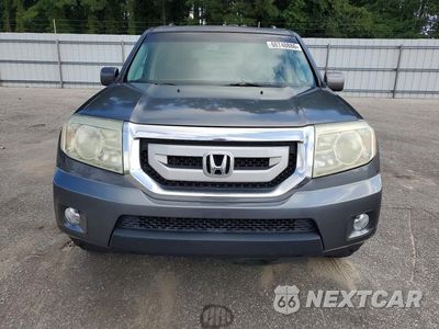 Piąte zdjęcie samochodu w środku: 2011 HONDA PILOT EXL VIN:5FNYF4H51BB093222 - miniatura