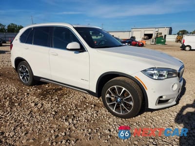 Czwarte zdjęcie samochodu z boku: 2018 BMW X5 XDR40E VIN:5UXKT0C57J0W02451 - miniatura