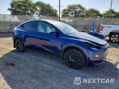 Czwarte zdjęcie samochodu z boku: 2024 TESLA MODEL Y VIN:7SAYGAEE6RF984328 - miniatura